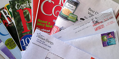 Mail and catalogs in post office boxes in Lansing, KS